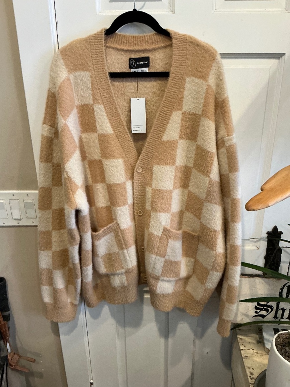 Original Use men’s cardigan sweater brand new with tags! Size XXL